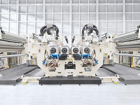 Rail brakes support fast roller changes in laminating units